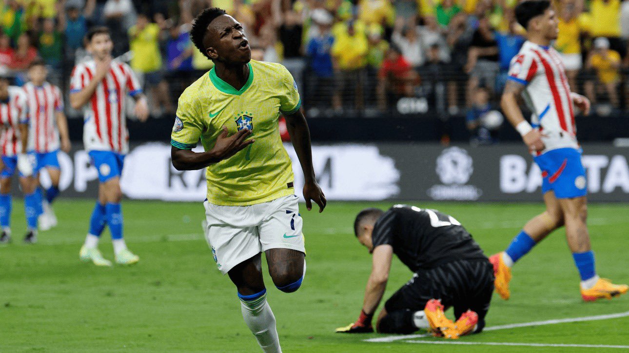 Vini Jr comemorando gol (foto: Evork Djansezian / AFP)