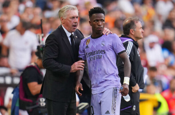 Técnico e jogador (foto: Oscar del Pozo/AFP via Getty Images)