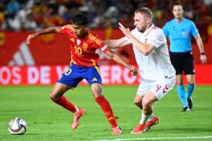 No encontro do primeiro turno, Espanha ganhou por 1 a 0 (foto: JOSE JORDAN / AFP)