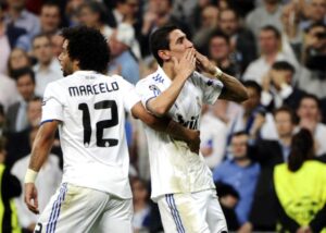 Marcelo e Di María pelo Real Madrid (foto: AFP PHOTO/ PIERRE -PHILIPPE MARCOU)